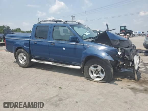 2001 Nissan Frontier SE with VIN 1N6ED27T41C347012, listed as a Copart auction lot 59388375 with 284,480 mi miles and Salvage title. Bid and sale history available at DreamBid. Image 4.