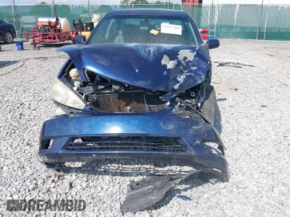 2005 Toyota Camry LE with VIN 4T1BF30K55U105946, listed as a IAAI auction lot 42567700 with Not provided miles and . Bid and sale history available at DreamBid. Image 6.