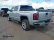2018 GMC Sierra 1500 SLT z VIN 3GTU2NEC2JG556450, wystawiony jako IAAI lot #42597145 z przebiegiem 122 940 mil mil oraz . Historia ofert i sprzedaży dostępna na DreamBid. Obrazek 3.