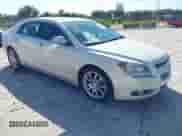 2012 Chevrolet Malibu LTZ z VIN 1G1ZG5E75CF156969, wystawiony jako IAAI lot #42576487 z przebiegiem 107 729 mil mil oraz . Historia ofert i sprzedaży dostępna na DreamBid. Obrazek 1.