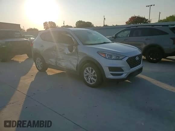 2020 Hyundai Tucson Value с VIN KM8J33A41LU127668, выставлен на аукционе Copart как лот 80253595 с пробегом 132 012 миль миль и Списание • Salvage title. История ставок и продаж доступна на DreamBid. Изображение 14.