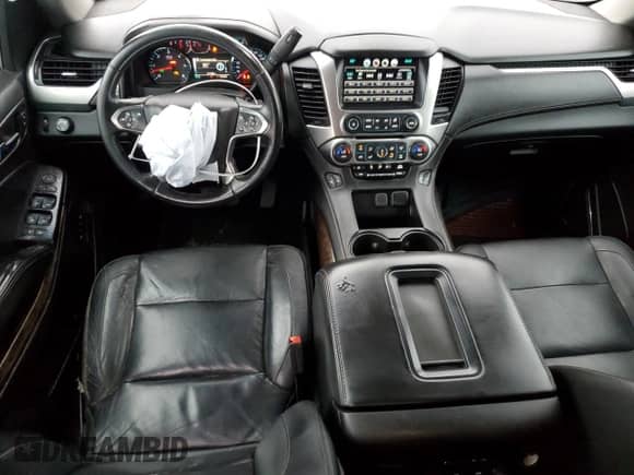 2016 Chevrolet Suburban LT с VIN 1GNSCHKCXGR219437, выставлен на аукционе Copart как лот 72822734 с пробегом 51 086 миль миль и Списание • Salvage title. История ставок и продаж доступна на DreamBid. Изображение 8.