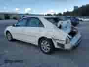 2002 Toyota Camry XLE z VIN 4T1BE32K52U112567, wystawiony jako Copart lot #84189535 z przebiegiem 154 151 mil mil oraz Szkoda całkowita • Salvage title. Historia ofert i sprzedaży dostępna na DreamBid. Obrazek 2.