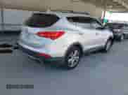 2013 Hyundai Santa Fe Sport with VIN 5XYZU3LA0DG098741, listed as a IAAI auction lot 43054236 with 136,127 mi miles and . Bid and sale history available at DreamBid. Image 4.
