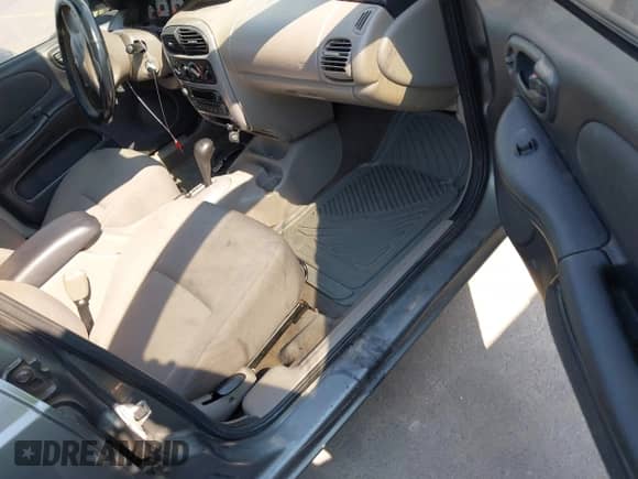 2005 Dodge Neon SXT with VIN 1B3ES56C65D130333, listed as a IAAI auction lot 43243585 with 209,552 mi miles and . Bid and sale history available at DreamBid. Image 5.