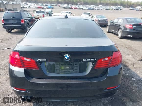 2016 BMW 5 Series 528i xDrive with VIN WBA5A7C55GG148999, listed as a IAAI auction lot 42931192 with 157,996 mi miles and . Bid and sale history available at DreamBid. Image 16.