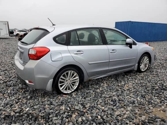 2012 Subaru Impreza Premium with VIN JF1GPAD68CG201760, listed as a Copart auction lot 71925385 with 137,667 mi miles and Clean title. Bid and sale history available at DreamBid. Image 3.