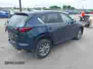 2024 Mazda CX-5 S Preferred z VIN JM3KFBCL2R0446390, wystawiony jako IAAI lot #42624381 z przebiegiem 21 293 mil mil oraz . Historia ofert i sprzedaży dostępna na DreamBid. Obrazek 4.