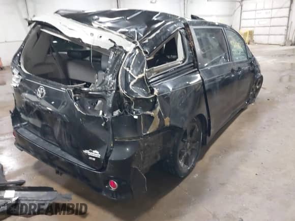 2011 Toyota Sienna SE with VIN 5TDXK3DC1BS172813, listed as a IAAI auction lot 41643352 with 172,385 mi miles and . Bid and sale history available at DreamBid. Image 4.
