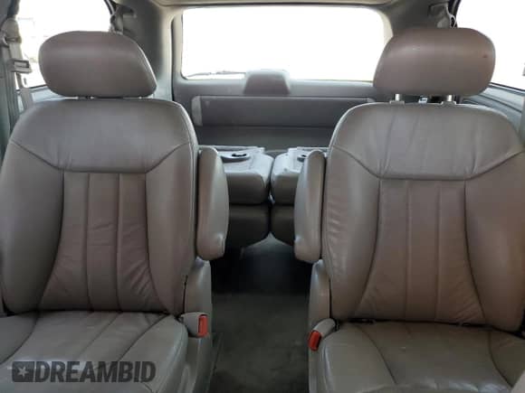 2003 Dodge Caravan ES z VIN 2D4GP54L93R135678, wystawiony jako Copart lot #68492485 z przebiegiem 239 392 mil mil oraz Szkoda całkowita • Salvage title. Historia ofert i sprzedaży dostępna na DreamBid. Obrazek 10.