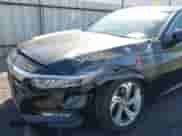 2018 Honda Accord EX-L with VIN 1HGCV1F57JA133049, listed as a IAAI auction lot 42773827 with 113,865 mi miles and . Bid and sale history available at DreamBid. Image 6.