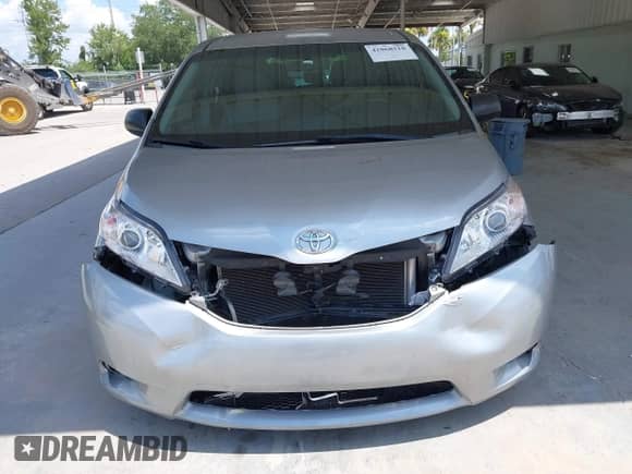 2015 Toyota Sienna L with VIN 5TDZK3DCXFS607178, listed as a IAAI auction lot 42868518 with 318,805 mi miles and . Bid and sale history available at DreamBid. Image 12.