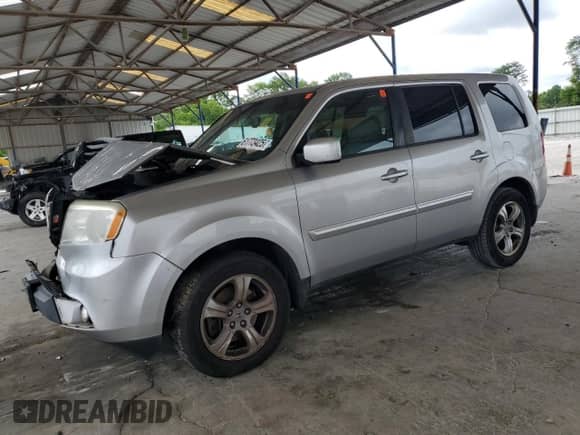 2014 Honda Pilot EX-L with VIN 5FNYF3H62EB009786, listed as a Copart auction lot 61773425 with Not provided miles and Salvage title. Bid and sale history available at DreamBid. Image 1.