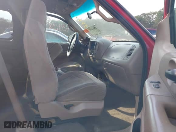 2000 Ford F-150 XL z VIN 1FTZX1723YNB86616, wystawiony jako IAAI lot #43413899 z przebiegiem Nie podano mil oraz . Historia ofert i sprzedaży dostępna na DreamBid. Obrazek 5.