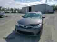 2013 Toyota Camry LE z VIN 4T1BD1FK9DU084793, wystawiony jako Copart lot #83826515 z przebiegiem 169 152 mil mil oraz Szkoda całkowita • Salvage title. Historia ofert i sprzedaży dostępna na DreamBid. Obrazek 13.