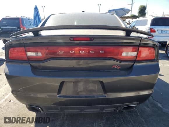 2014 Dodge Charger Road/Track with VIN 2C3CDXCT0EH330258, listed as a Copart auction lot 90421655 with 114,910 mi miles and Clean title. Bid and sale history available at DreamBid. Image 6.