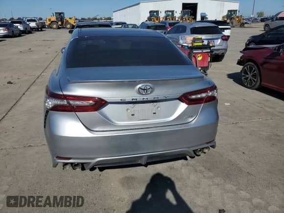 2018 Toyota Camry XSE с VIN 4T1B61HK5JU620397, выставлен на аукционе Copart как лот 86426265 с пробегом 50 459 миль миль и Списание • Salvage title. История ставок и продаж доступна на DreamBid. Изображение 6.