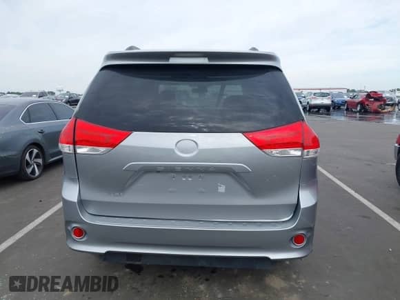 2014 Toyota Sienna SE with VIN 5TDXK3DC6ES421515, listed as a IAAI auction lot 43102179 with 63,756 mi miles and . Bid and sale history available at DreamBid. Image 16.