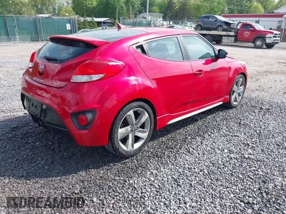 2013 Hyundai Veloster Turbo с VIN KMHTC6AE6DU146902, выставлен на аукционе IAAI как лот 42276203 с пробегом 117 752 миль миль и . История ставок и продаж доступна на DreamBid. Изображение 4.