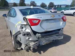 2017 Chevrolet Cruze LT z VIN 1G1BE5SM6H7119044, wystawiony jako IAAI lot #43381537 z przebiegiem 116 350 mil mil oraz . Historia ofert i sprzedaży dostępna na DreamBid. Obrazek 6.