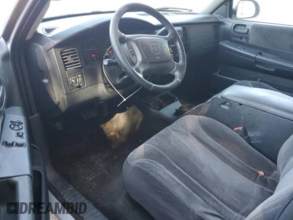 2004 Dodge Dakota SLT z VIN 1D7GL42N54S750919, wystawiony jako Copart lot #74625574 z przebiegiem 174 107 mil mil oraz Czysty tytuł • Clean title. Historia ofert i sprzedaży dostępna na DreamBid. Obrazek 8.