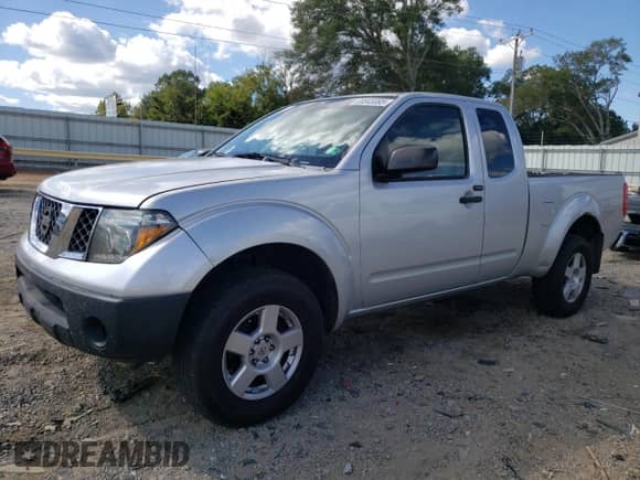2007 Nissan Frontier XE with VIN 1N6BD06T97C405875, listed as a Copart auction lot 80845995 with 242,895 mi miles and Salvage title. Bid and sale history available at DreamBid. Image 1.