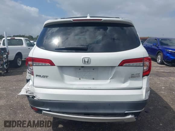 2020 Honda Pilot Elite with VIN 5FNYF6H05LB053582, listed as a IAAI auction lot 41721168 with 56,770 mi miles and . Bid and sale history available at DreamBid. Image 16.