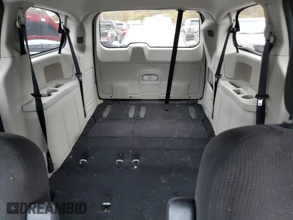 2013 Dodge Grand Caravan SXT z VIN 2C4RDGCG1DR659410, wystawiony jako Copart lot #90450215 z przebiegiem 117 242 mil mil oraz Czysty tytuł • Clean title. Historia ofert i sprzedaży dostępna na DreamBid. Obrazek 10.