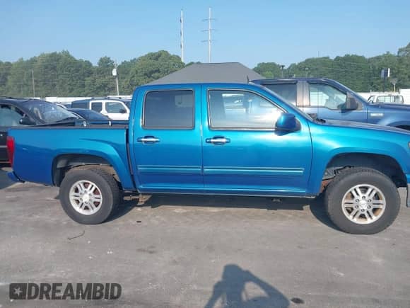 2011 Chevrolet Colorado 1LT z VIN 1GCHTCFE8B8133074, wystawiony jako IAAI lot #43024551 z przebiegiem 203 594 mil mil oraz . Historia ofert i sprzedaży dostępna na DreamBid. Obrazek 13.