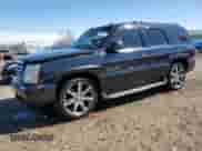 2004 Cadillac Escalade with VIN 1GYEC63TX4R104979, listed as a Copart auction lot 48992455 with 210,937 mi miles and Salvage title. Bid and sale history available at DreamBid. Image 1.