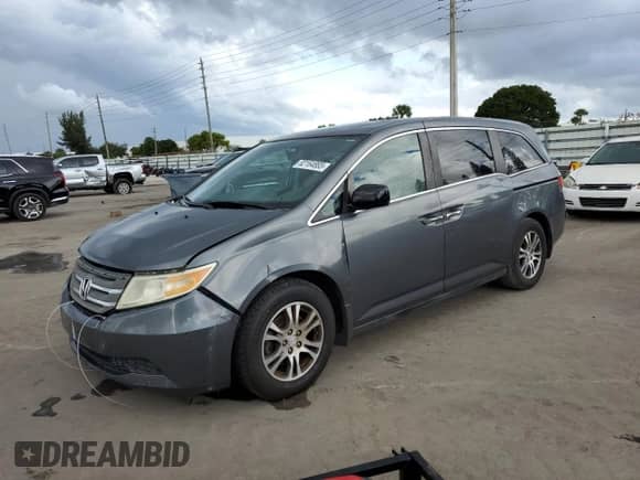 2013 Honda Odyssey EX-L с VIN 5FNRL5H68DB016510, выставлен на аукционе Copart как лот 82164885 с пробегом 353 830 миль миль и Чистый • Clean title. История ставок и продаж доступна на DreamBid. Изображение 1.