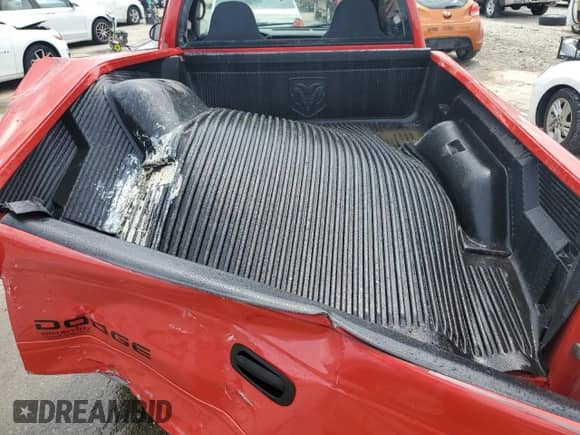 2003 Dodge Dakota с VIN 1D7FL16X03S222919, выставлен на аукционе Copart как лот 55414355 с пробегом 142 037 миль миль и На запчасти • Non repairable. История ставок и продаж доступна на DreamBid. Изображение 10.