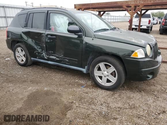 2010 Jeep Compass Sport z VIN 1J4NT1FB6AD626166, wystawiony jako Copart lot #88448045 z przebiegiem 181 098 mil mil oraz Szkoda całkowita • Salvage title. Historia ofert i sprzedaży dostępna na DreamBid. Obrazek 4.