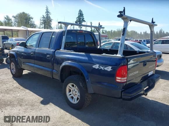 2003 Dodge Dakota Sport with VIN 1D7HG38X53S138620, listed as a IAAI auction lot 42337567 with 201,081 mi miles and . Bid and sale history available at DreamBid. Image 3.