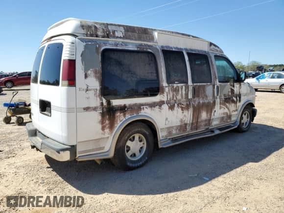 2002 Chevrolet Express с VIN 1GBFG15R221214329, выставлен на аукционе Copart как лот 49664955 с пробегом 108 408 миль миль и Чистый • Clean title. История ставок и продаж доступна на DreamBid. Изображение 3.
