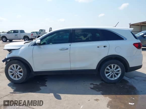 2019 Kia Sorento LX z VIN 5XYPG4A36KG553548, wystawiony jako IAAI lot #42924998 z przebiegiem 130 775 mil mil oraz . Historia ofert i sprzedaży dostępna na DreamBid. Obrazek 14.