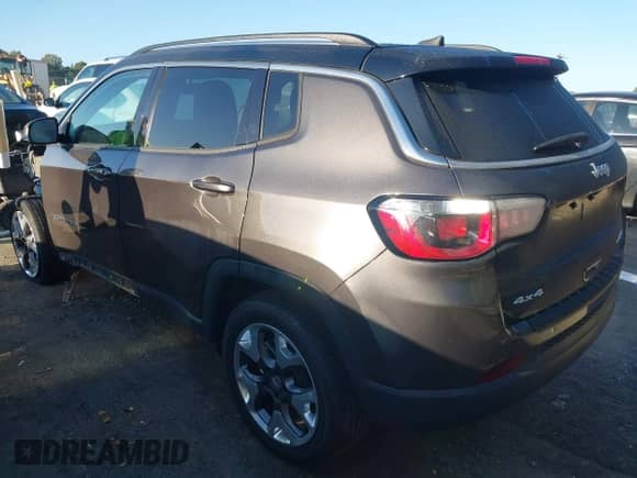 2019 Jeep Compass Limited with VIN 3C4NJDCB3KT842909, listed as a IAAI auction lot 43338860 with 100,667 mi miles and . Bid and sale history available at DreamBid. Image 3.