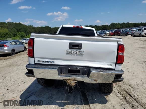 2015 GMC Sierra 1500 с VIN 1GTN2TEC5FZ241156, выставлен на аукционе Copart как лот 63439405 с пробегом 105 439 миль миль и Списание • Salvage title. История ставок и продаж доступна на DreamBid. Изображение 6.