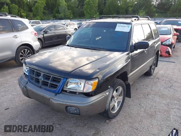 1999 Subaru Forester S with VIN JF1SF6552XH736647, listed as a IAAI auction lot 42565079 with 215,244 mi miles and . Bid and sale history available at DreamBid. Image 17.