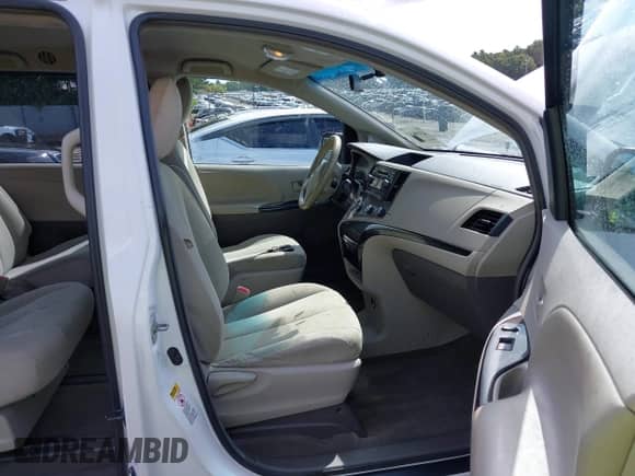 2012 Toyota Sienna with VIN 5TDZK3DC2CS219311, listed as a IAAI auction lot 43106345 with 158,446 mi miles and . Bid and sale history available at DreamBid. Image 5.