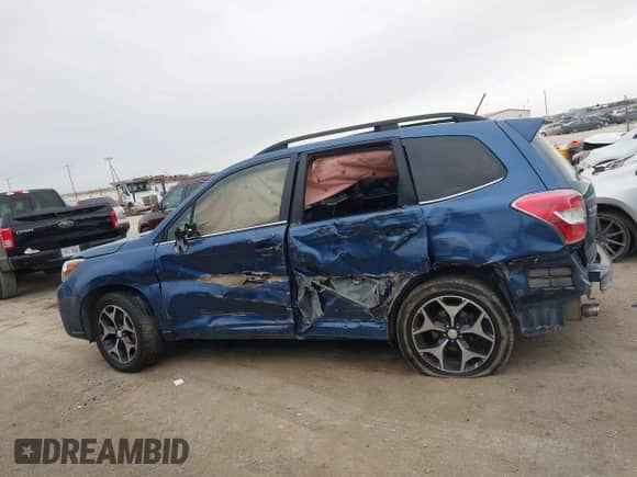 2014 Subaru Forester XT Touring z VIN JF2SJGMC9EH428341, wystawiony jako IAAI lot #41185804 z przebiegiem 111 000 mil mil oraz . Historia ofert i sprzedaży dostępna na DreamBid. Obrazek 14.