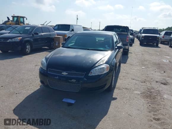 2013 Chevrolet Impala LS with VIN 2G1WA5E3XD1120124, listed as a IAAI auction lot 42360600 with 77,081 mi miles and . Bid and sale history available at DreamBid. Image 2.