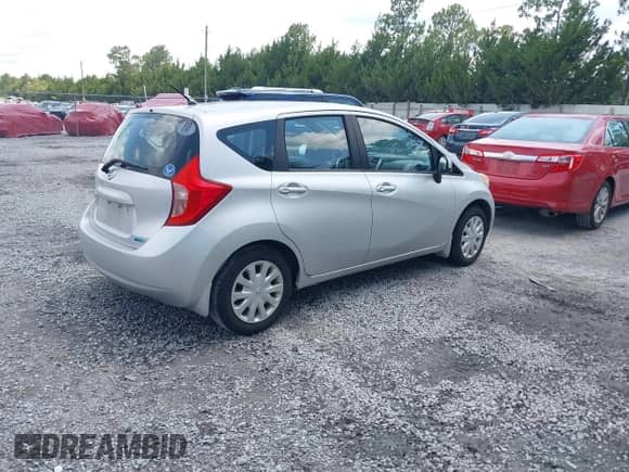 2014 Nissan Note S Plus z VIN 3N1CE2CPXEL354267, wystawiony jako IAAI lot #42582615 z przebiegiem 105 182 mil mil oraz . Historia ofert i sprzedaży dostępna na DreamBid. Obrazek 4.