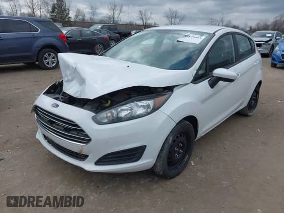 2017 Ford Fiesta S z VIN 3FADP4TJ2HM161814, wystawiony jako IAAI lot #41849003 z przebiegiem 107 836 mil mil oraz . Historia ofert i sprzedaży dostępna na DreamBid. Obrazek 2.