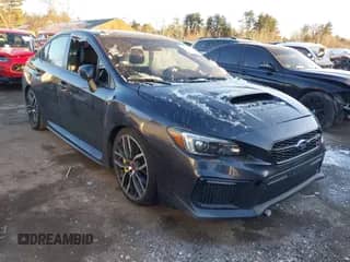 2018 Subaru WRX STI with VIN JF1VA2N61J9803902, listed as a IAAI auction lot 41403667 with 73,923 mi miles and . Bid and sale history available at DreamBid. Image 1.
