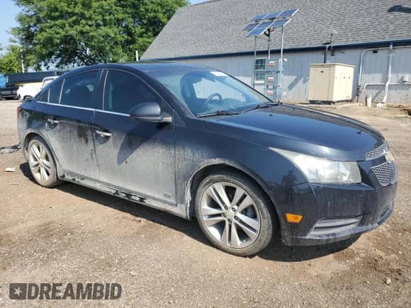 2011 Chevrolet Cruze LTZ z VIN 1G1PH5S90B7285155, wystawiony jako Copart lot #63095555 z przebiegiem 187 301 mil mil oraz Czysty tytuł • Clean title. Historia ofert i sprzedaży dostępna na DreamBid. Obrazek 4.