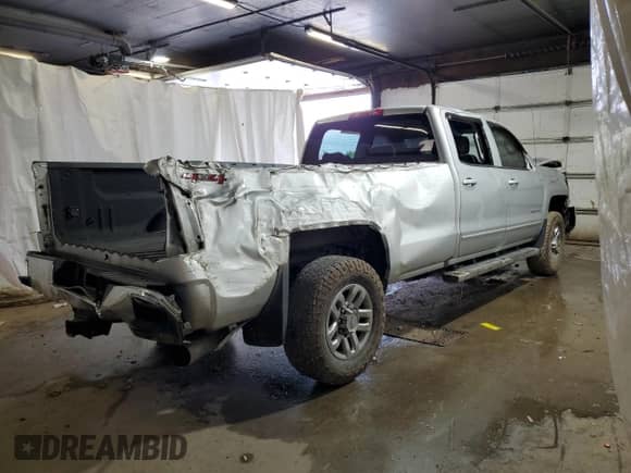 2018 Chevrolet Silverado 3500HD LT с VIN 1GC4KZCY0JF228287, выставлен на аукционе Copart как лот 63870935 с пробегом 106 321 миль миль и Списание • Salvage title. История ставок и продаж доступна на DreamBid. Изображение 3.