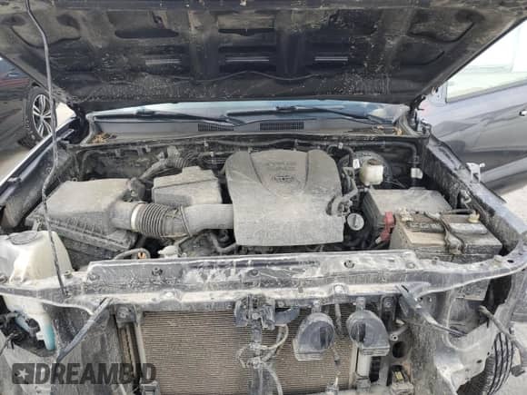 2023 Toyota Tacoma SR z VIN 3TYCZ5AN2PT126947, wystawiony jako Copart lot #70491195 z przebiegiem 69 236 mil mil oraz Szkoda całkowita • Salvage title. Historia ofert i sprzedaży dostępna na DreamBid. Obrazek 11.