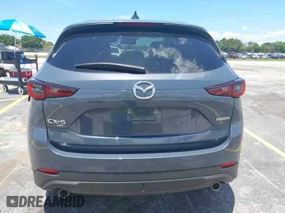 2023 Mazda CX-5 S Carbon Edition z VIN JM3KFBCM2P0200445, wystawiony jako IAAI lot #42745392 z przebiegiem 21 932 mil mil oraz . Historia ofert i sprzedaży dostępna na DreamBid. Obrazek 17.