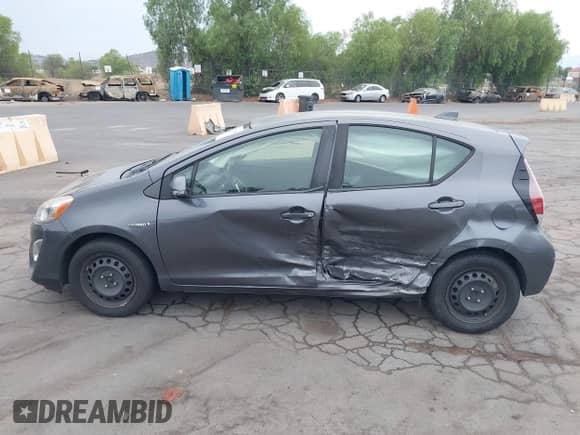 2015 Toyota Prius One z VIN JTDKDTB39F1107024, wystawiony jako IAAI lot #43111598 z przebiegiem 325 635 mil mil oraz . Historia ofert i sprzedaży dostępna na DreamBid. Obrazek 14.